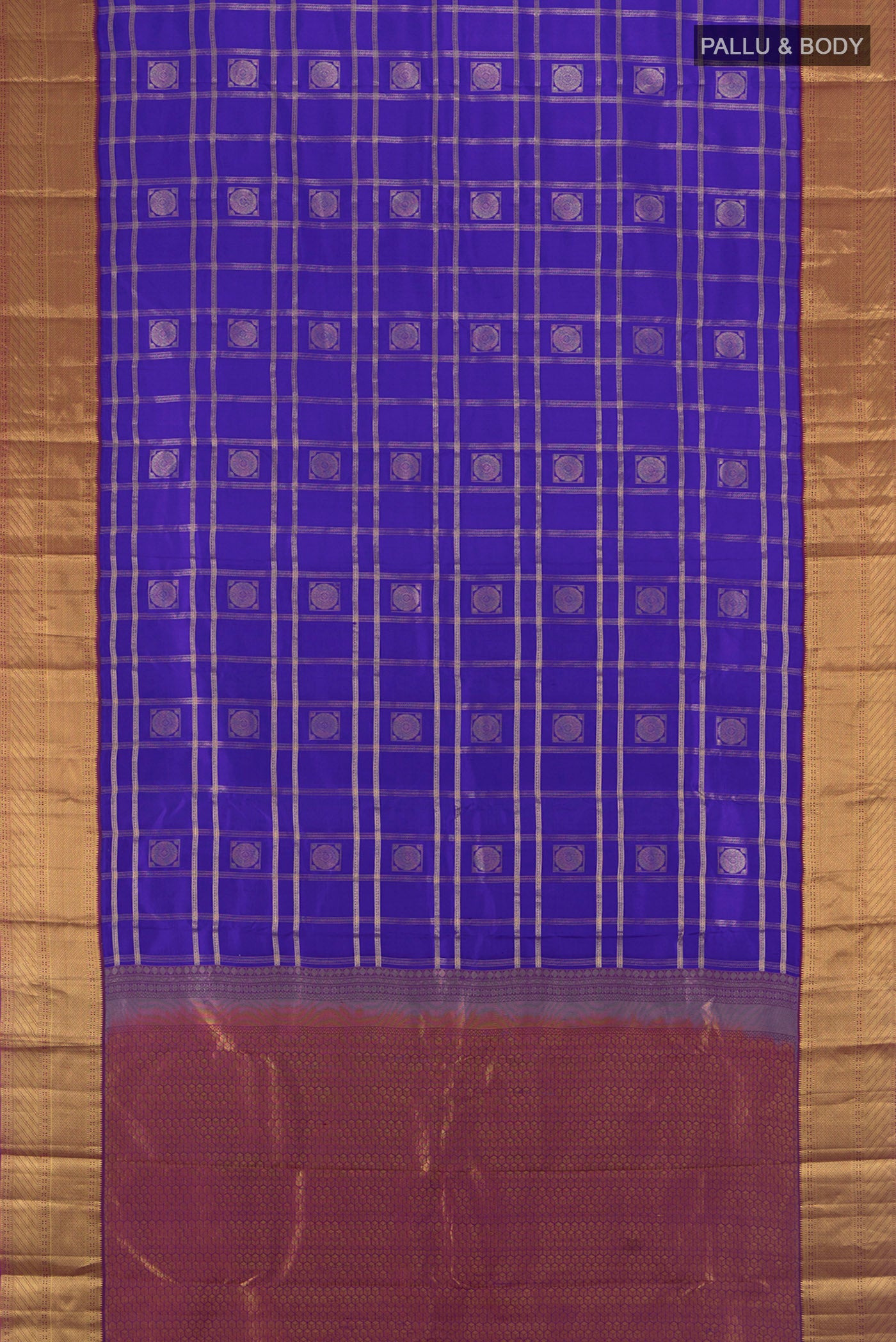Flat view of Royal Blue Kanchipuram Silk Saree with Checked design on the body and Zari Border. 