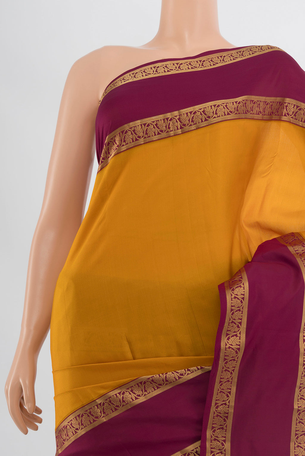 Border image of Mustard Kanchipuram Silk Saree with Zari Butta on the body and Silk Border. 
