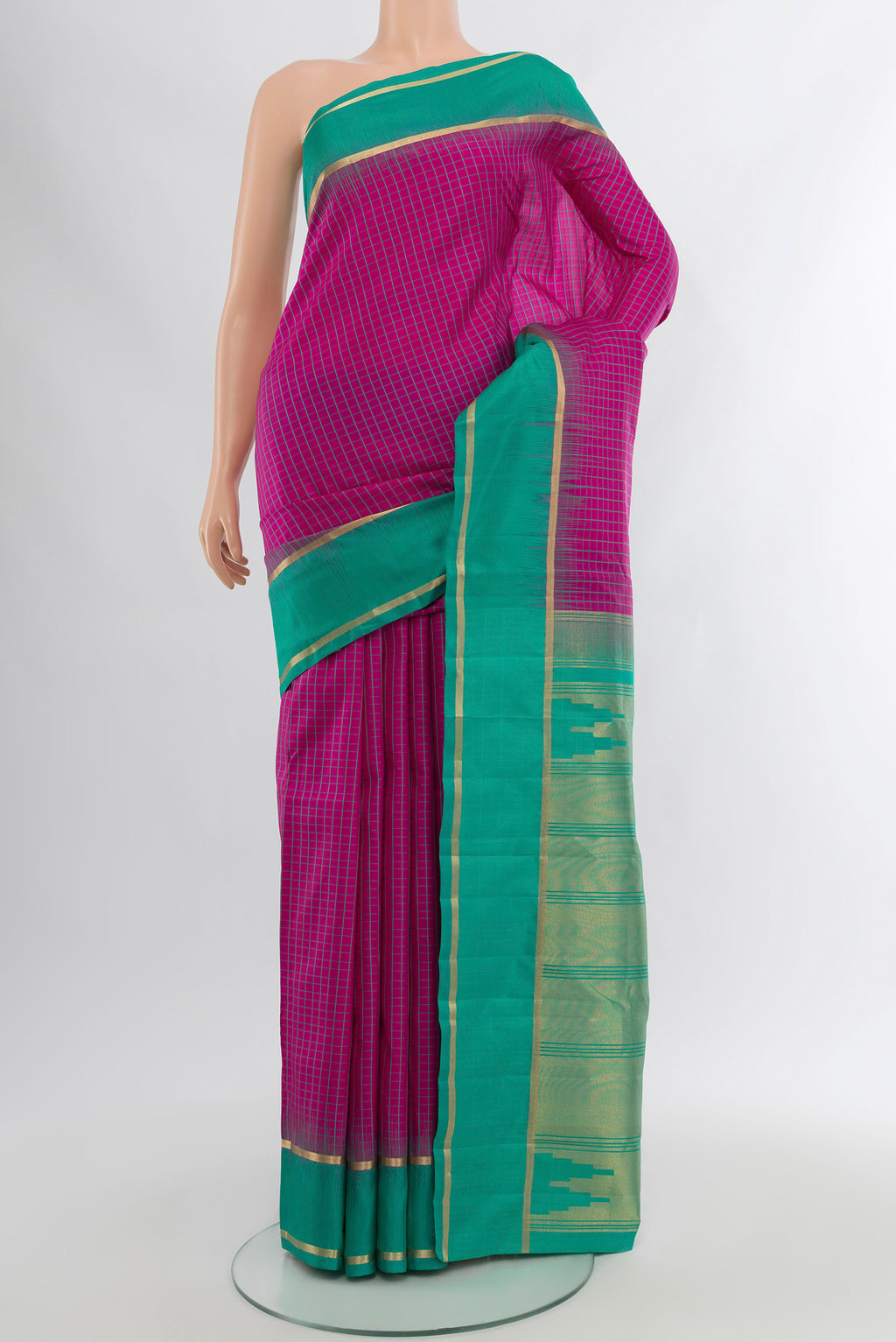 Rani Pink Kanchipuram Silk Saree with Checked design on the body and Silk Border.  displayed on a mannequin