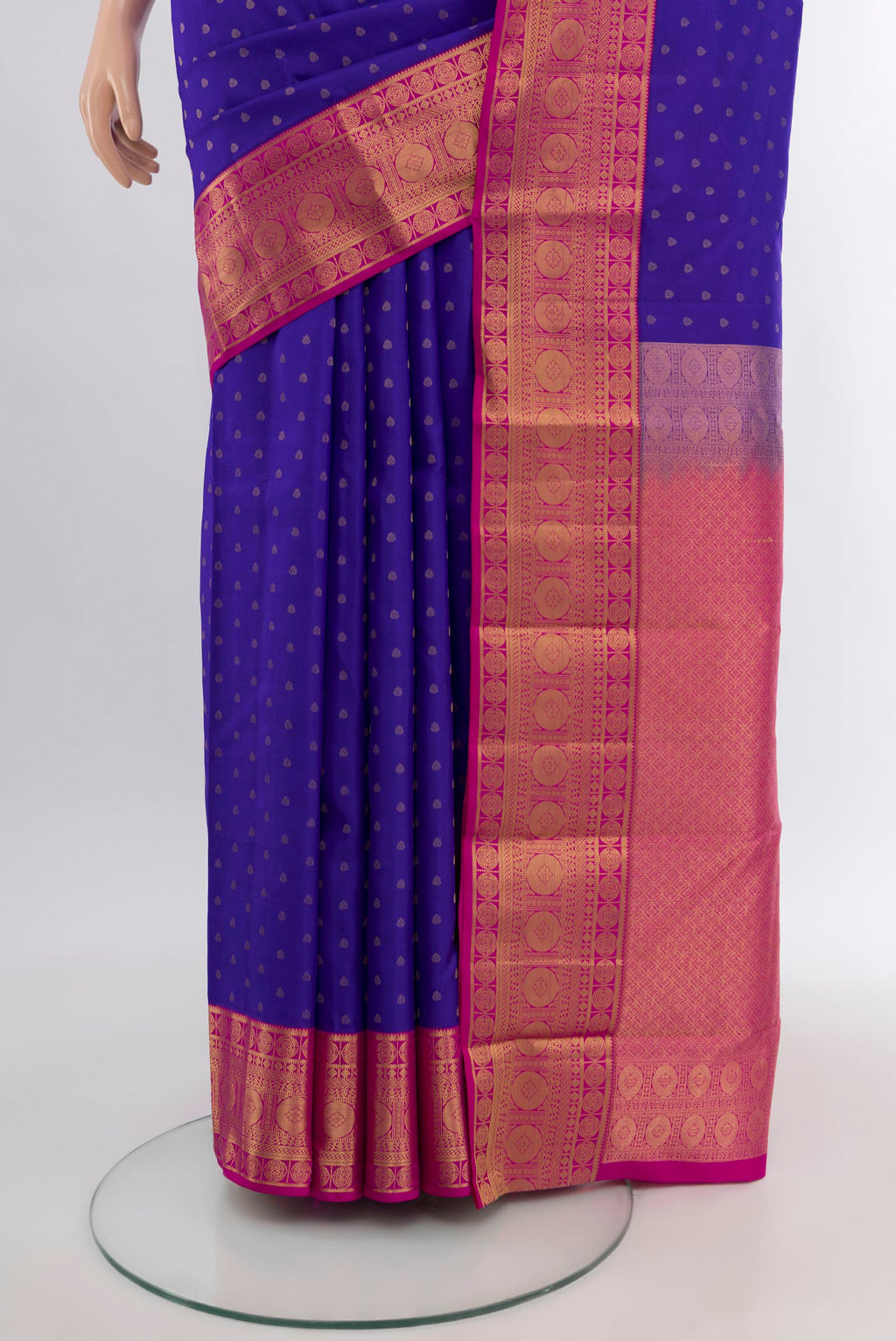 Pleats and pallu of Royal Blue Kanchipuram Silk Saree with Zari Butta on the body and Zari Border. 