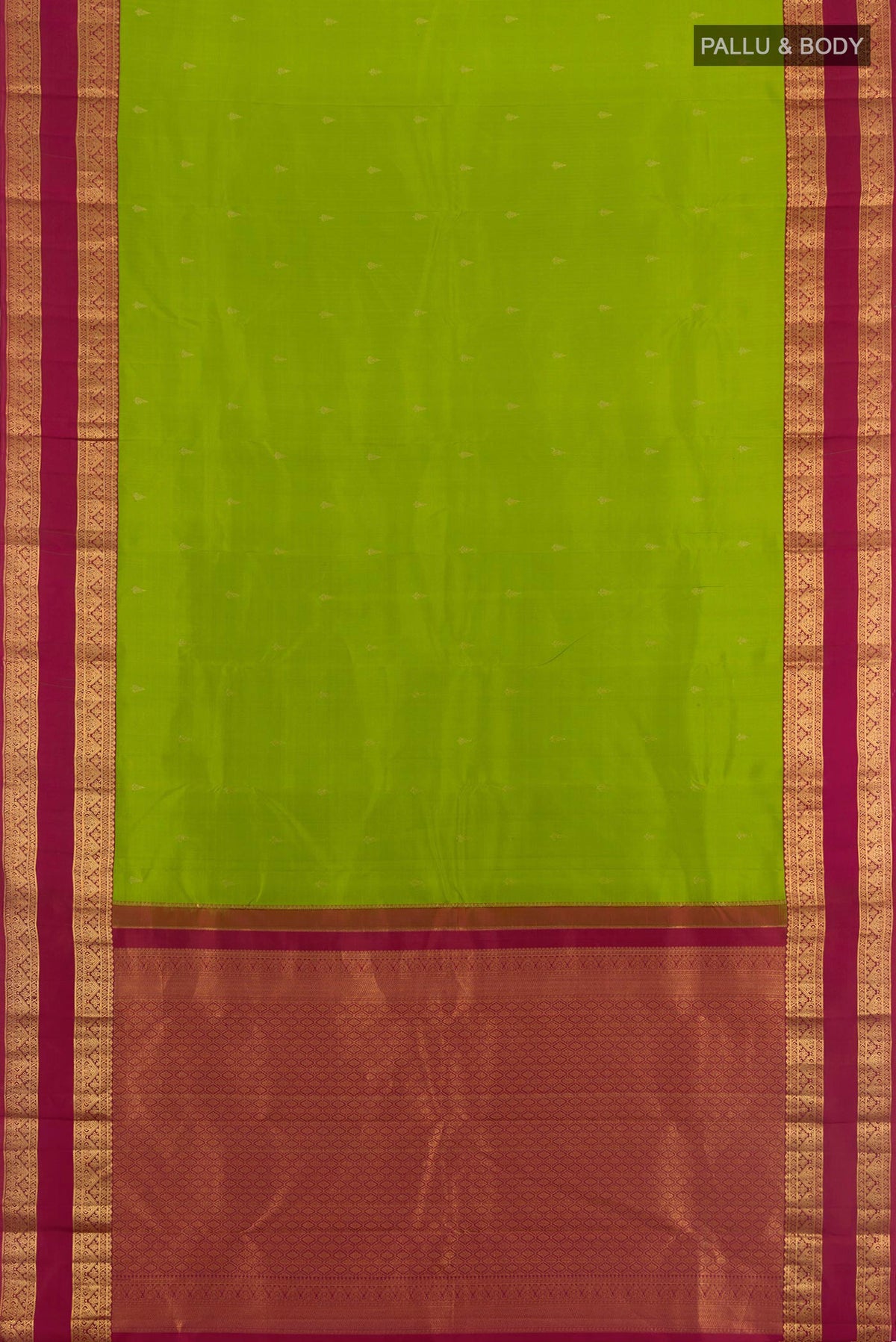 Flat view of Pure Silk Parrot Green Kanchipuram Saree with Zari Butta on the body and Zari Border. 