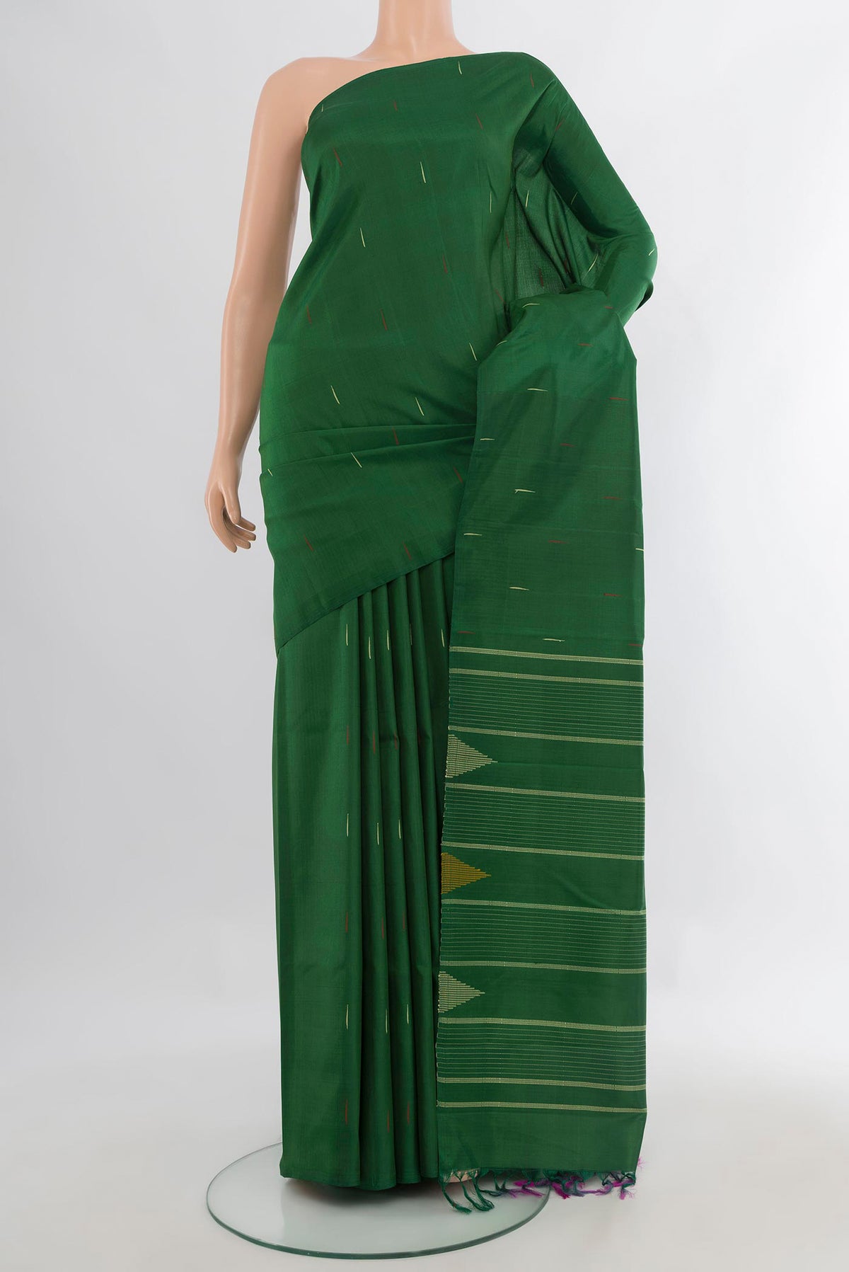Pure Silk Green Kanchipuram Saree with Thread Butta on the body and Without Border.  displayed on a mannequin