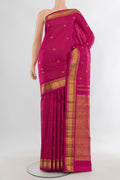 Pure Silk Dark Pink Kanchipuram Saree with Checked design on the body and Zari Border.  displayed on a mannequin