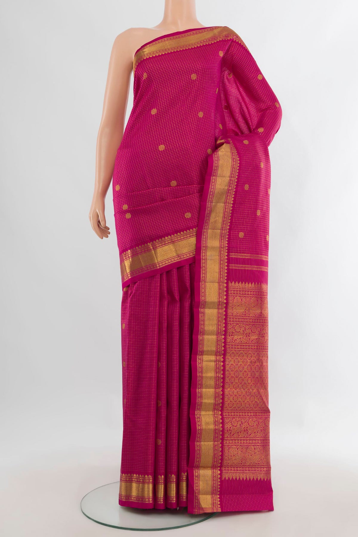 Pure Silk Dark Pink Kanchipuram Saree with Checked design on the body and Zari Border.  displayed on a mannequin