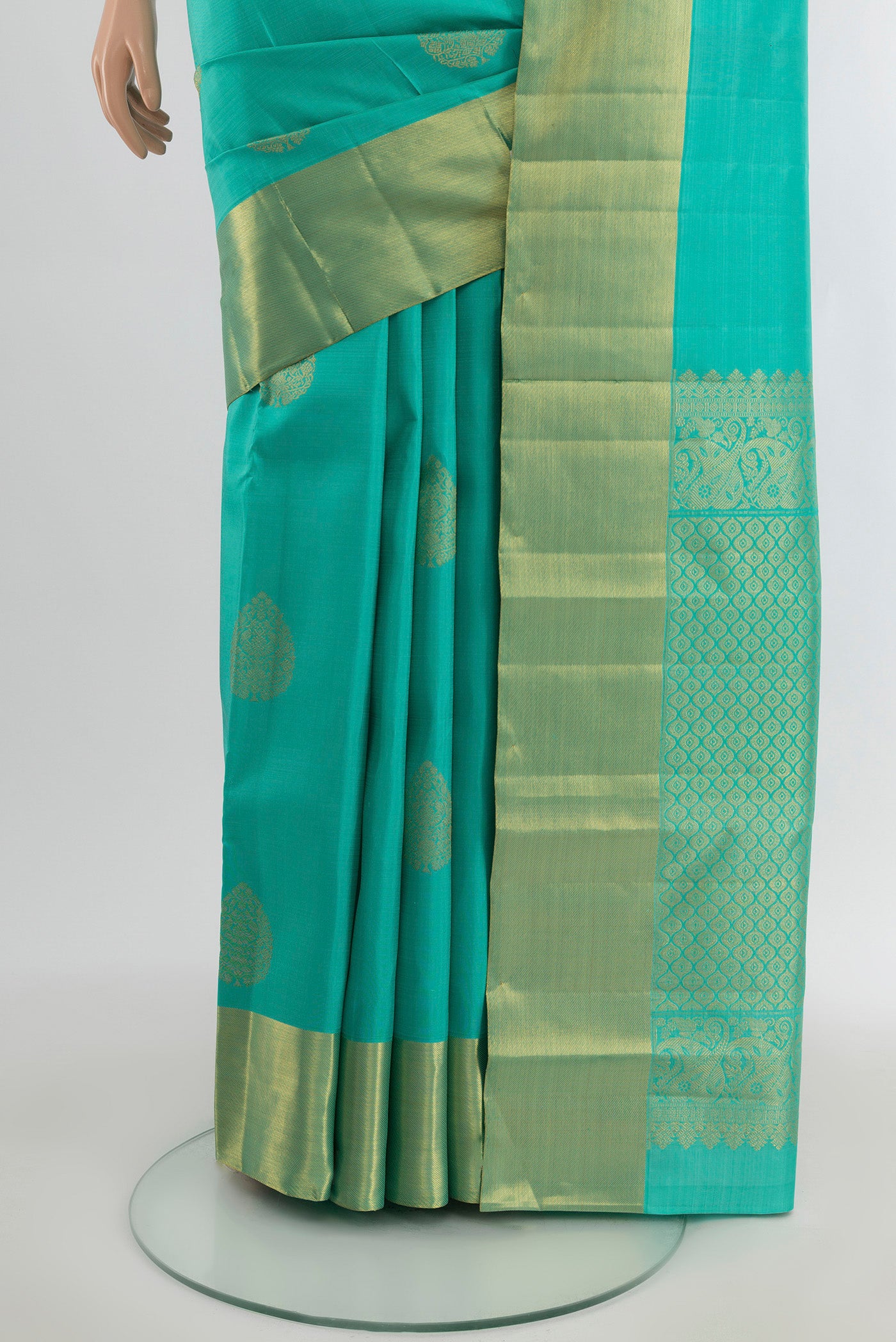 Pleats and pallu of Sky Blue Kanchipuram Silk Saree with Zari Butta on the body and Zari Border. 