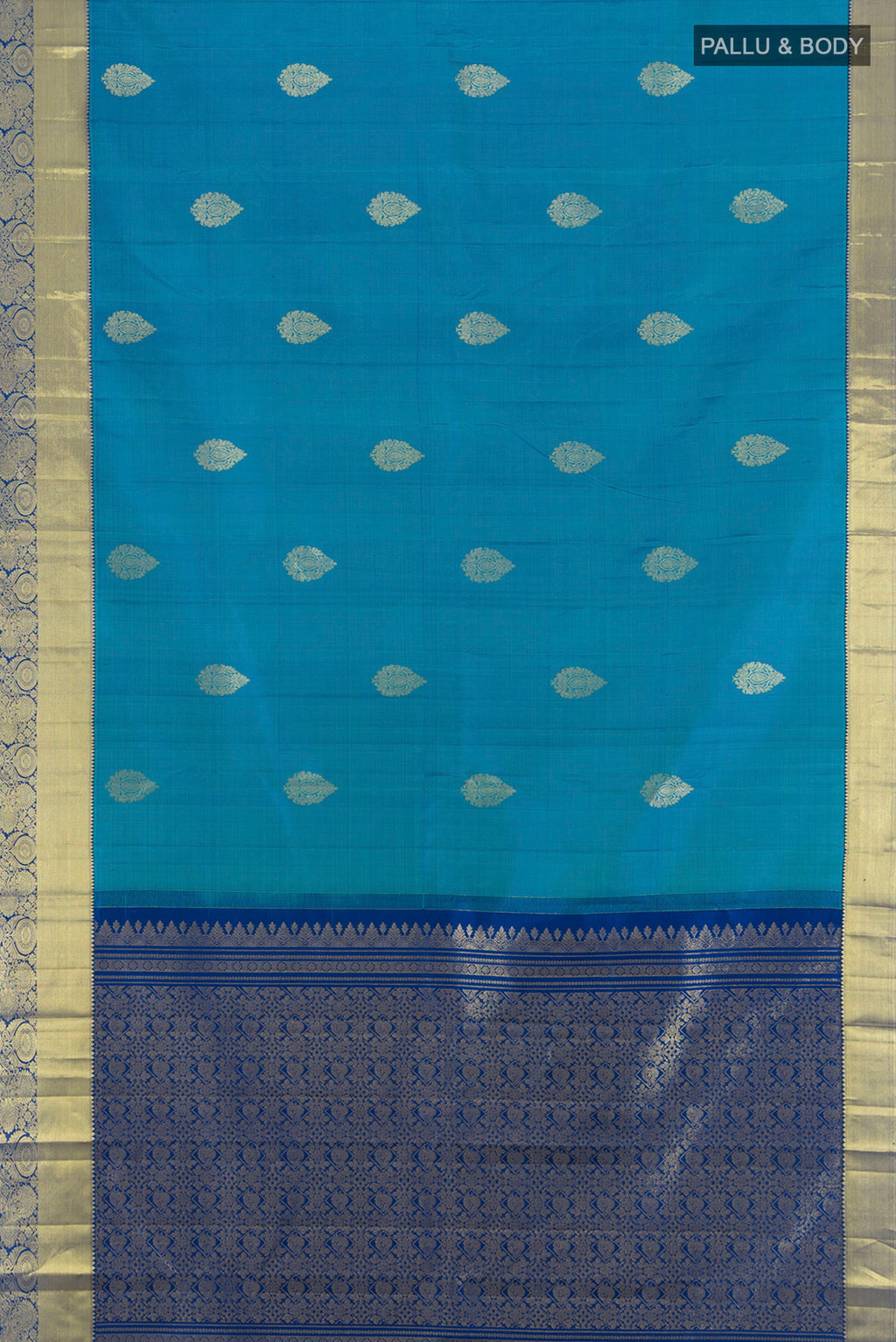 Flat view of Blue Kanchipuram Silk Saree with Zari Butta on the body and Zari Border. 