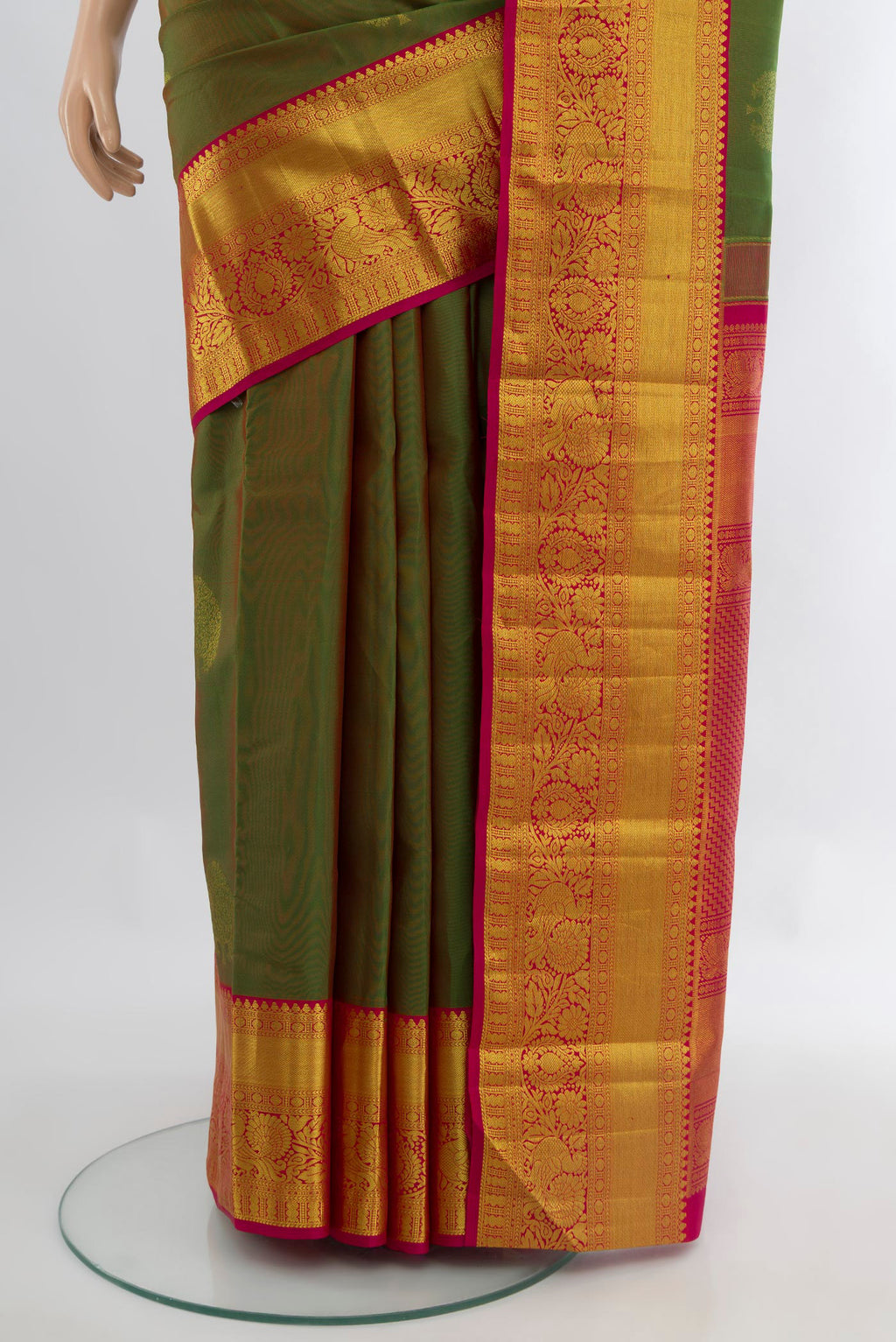 Pleats and pallu of Light Green Kanchipuram Silk Saree with Zari Butta on the body and Zari Border. 