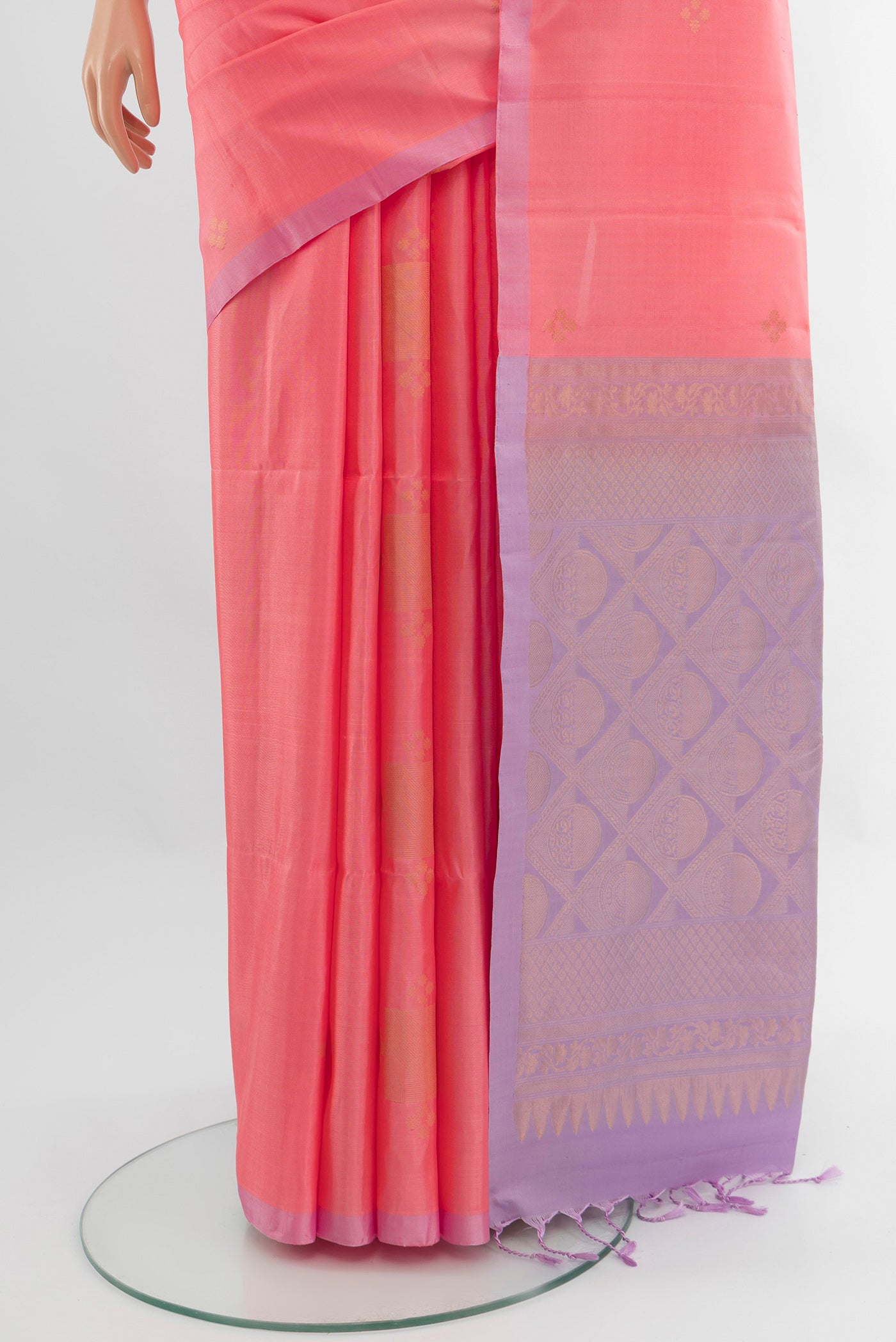 Pleats and pallu of Rose pink Soft Silk Saree with Zari Butta on the body and Without Border. 
