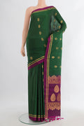 Pure Silk Green Soft Saree with Zari Butta on the body and Plain Border.  displayed on a mannequin
