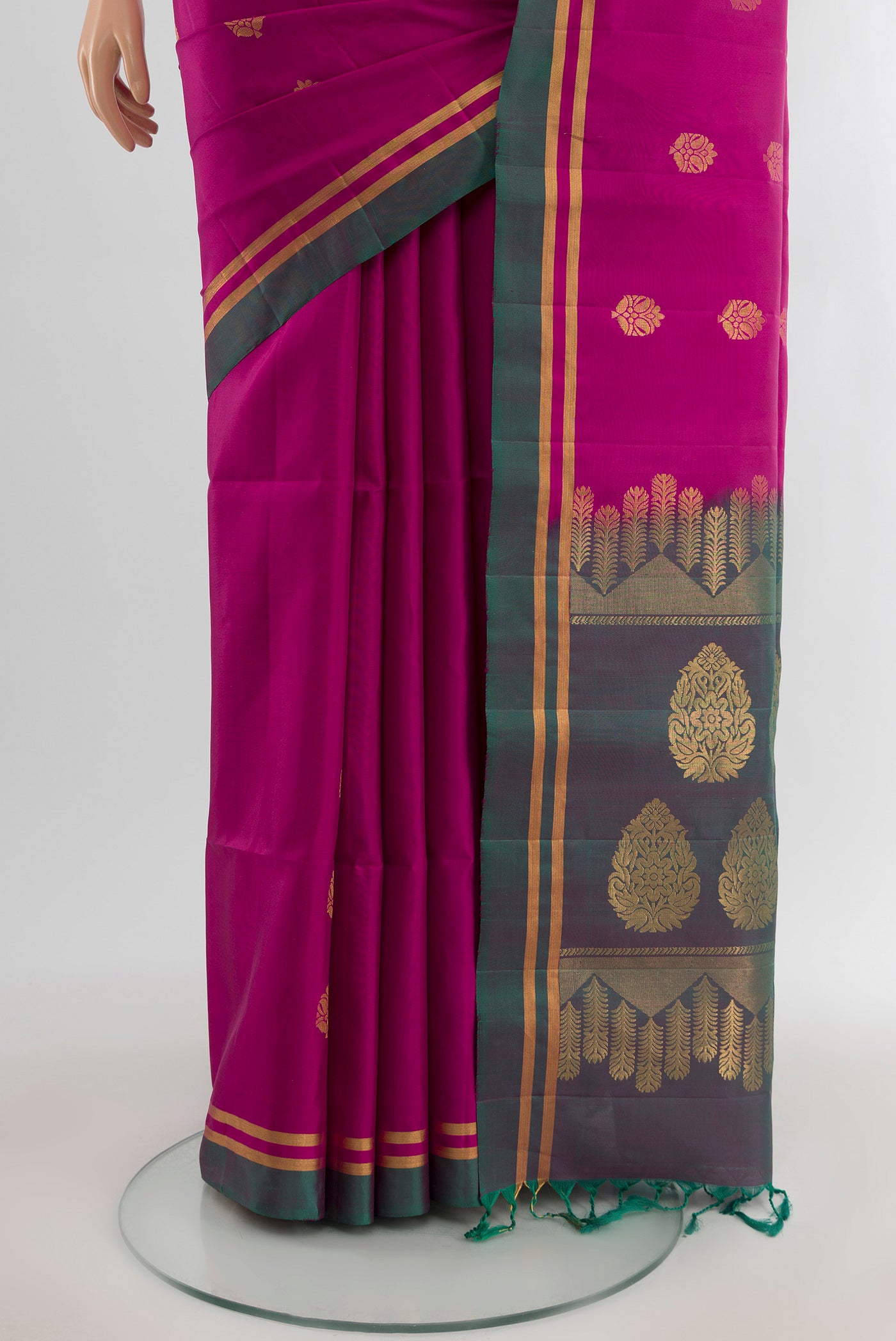Pleats and pallu of Light Magenta Soft Silk Saree with Zari Butta on the body and Plain Border. 