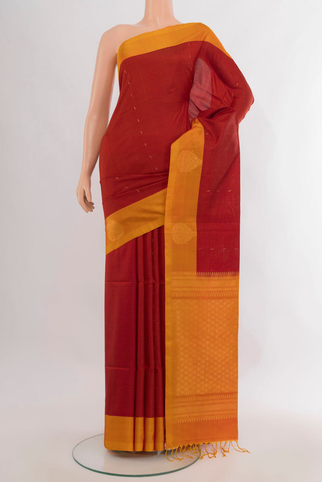 Pure Silk Red Soft Saree with Zari Butta on the body and Zari Border.  displayed on a mannequin