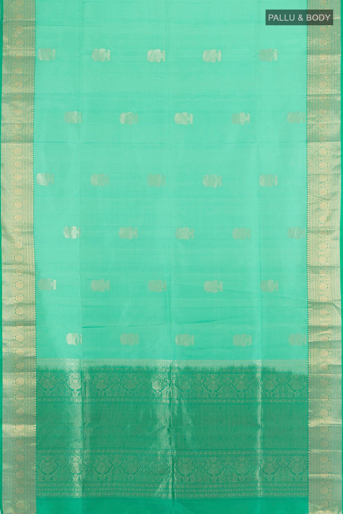 Flat view of Pure Silk Sea Green Soft Saree with Zari Butta on the body and Zari Border. 