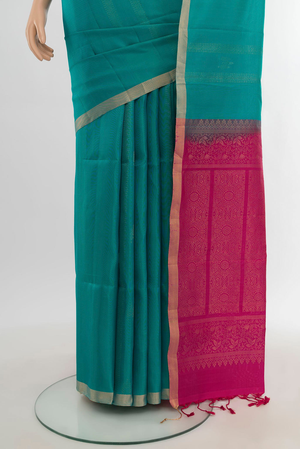 Pleats and pallu of Peacock Blue Soft Silk Saree with Stripes on the body and Without Border. 