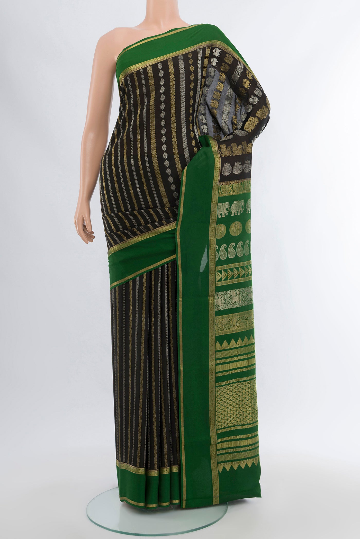 Black Georgette Saree with Zari Butta on the body and Silk Border.  displayed on a mannequin