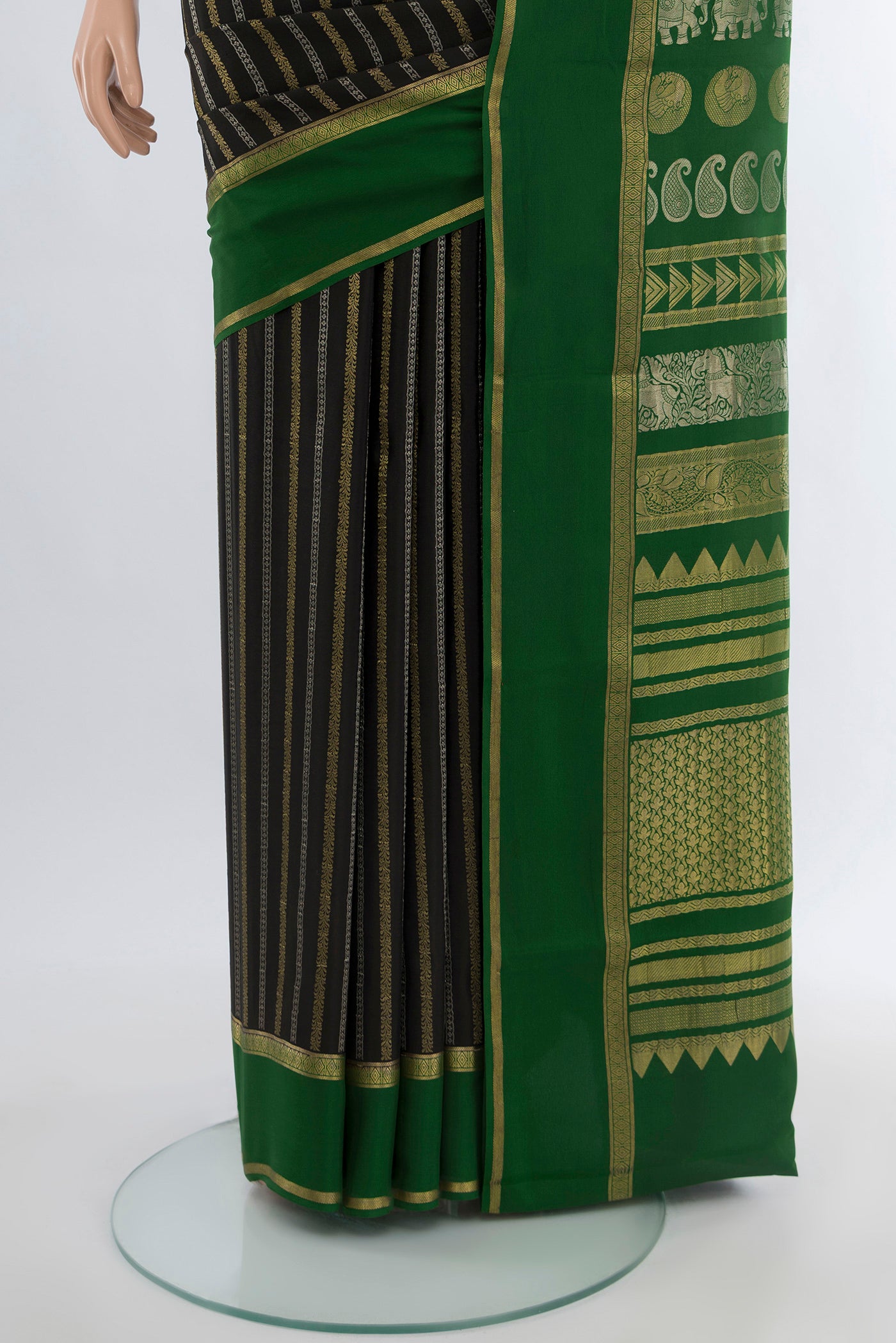 Pleats and pallu of Black Georgette Saree with Zari Butta on the body and Silk Border. 