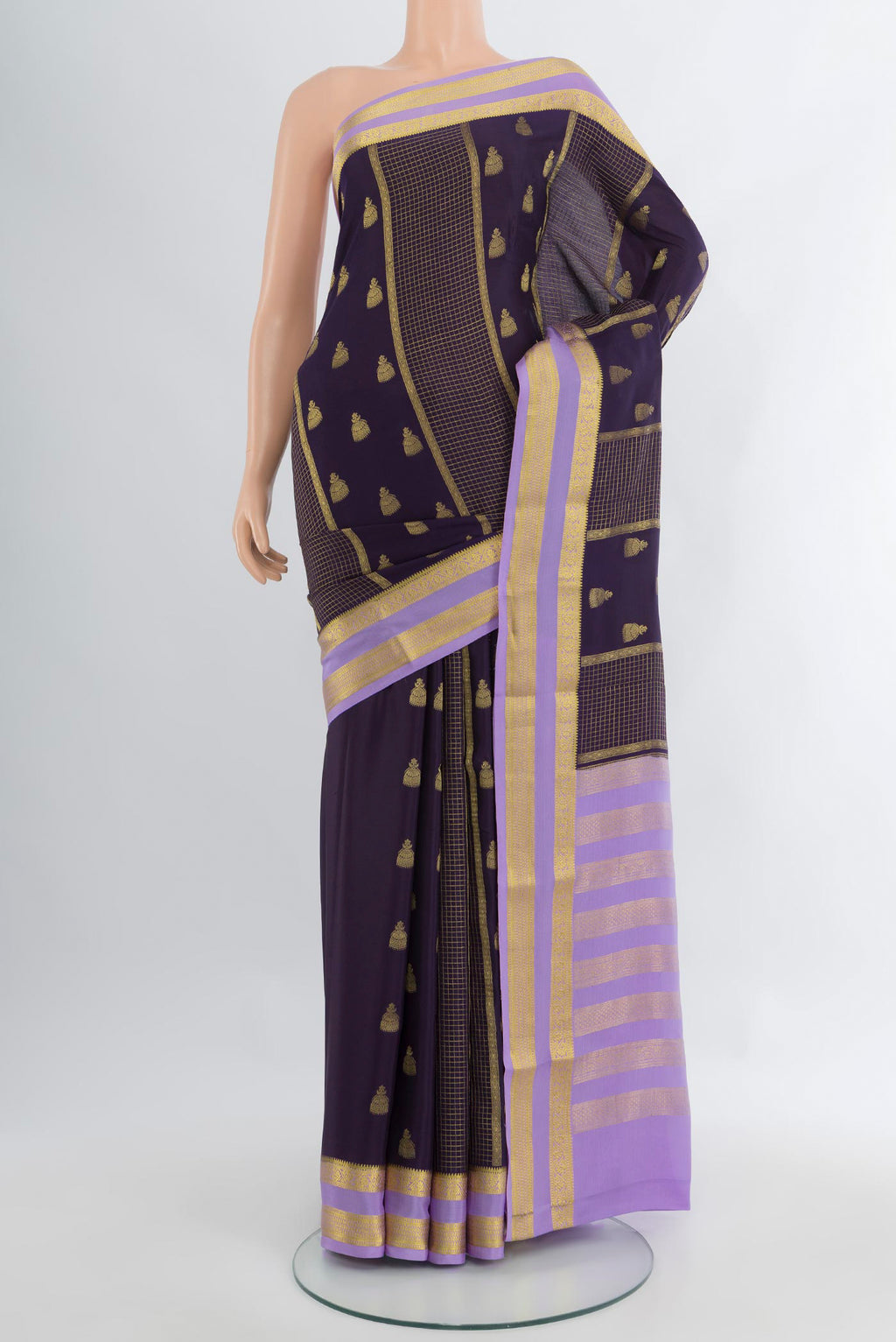 Navy Blue Mysore Crepe Saree with Zari Butta on the body and Zari Border.  displayed on a mannequin