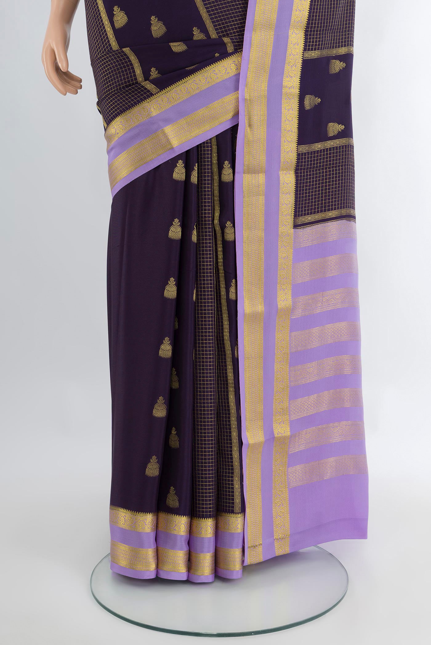 Pleats and pallu of Navy Blue Mysore Crepe Saree with Zari Butta on the body and Zari Border. 