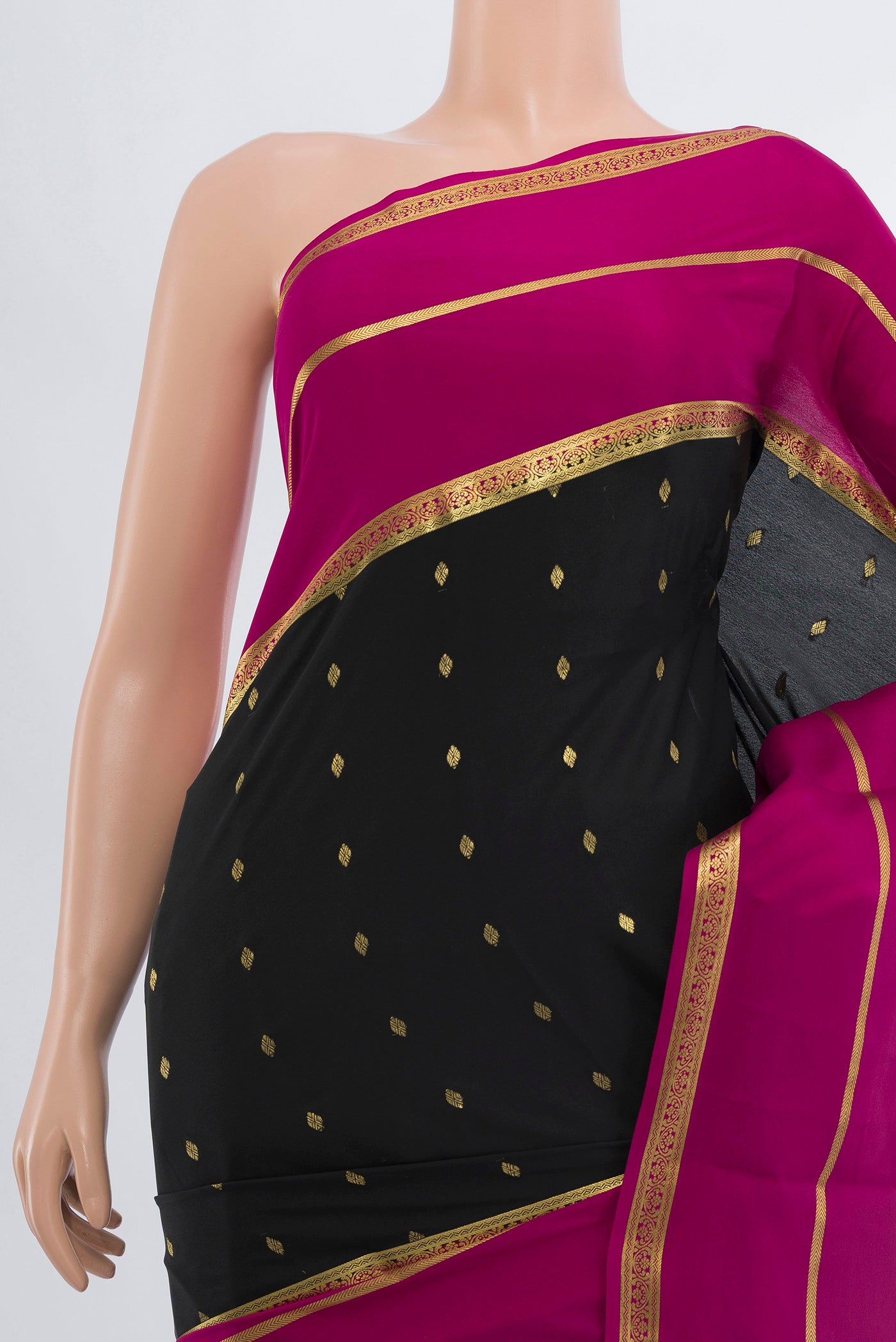 Border image of Black Mysore Crepe Saree with Zari Butta on the body and Silk Border. 