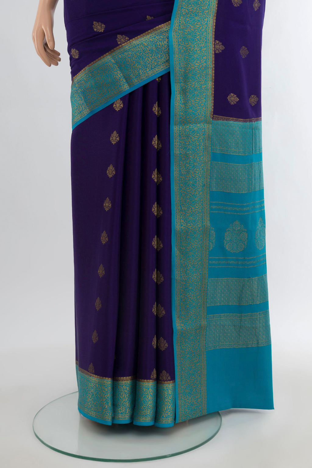 Pleats and pallu of Navy Blue Mysore Crepe Saree with Zari Butta on the body and Zari Border. 