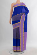 Royal Blue Mysore Crepe Saree with Zari Brocade on the body and Zari Border.  displayed on a mannequin
