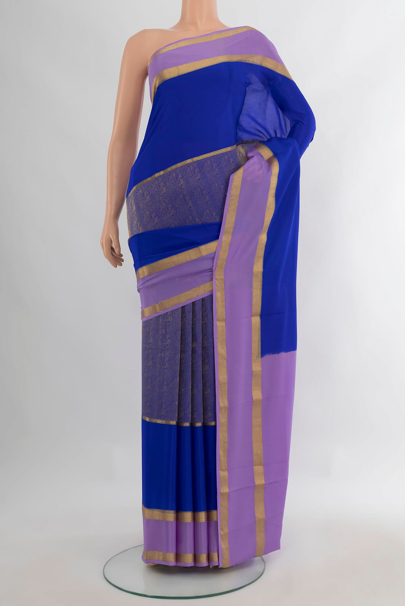 Royal Blue Mysore Crepe Saree with Zari Brocade on the body and Zari Border.  displayed on a mannequin