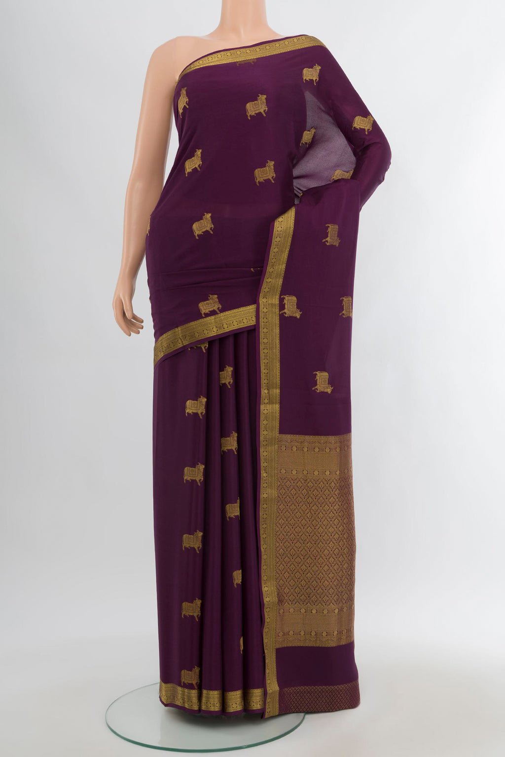 Purple Mysore Crepe Saree with Zari Butta on the body and Zari Border.  displayed on a mannequin