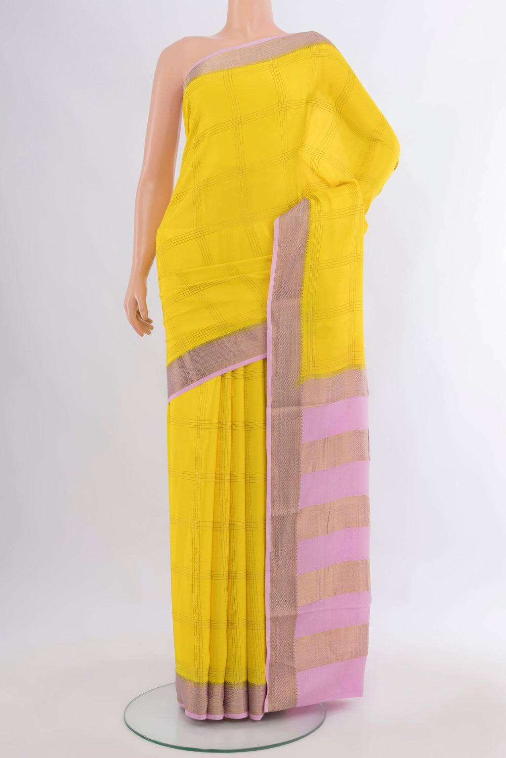Lemon Yellow Mysore Crepe Saree with Checked design on the body and Zari Border.  displayed on a mannequin