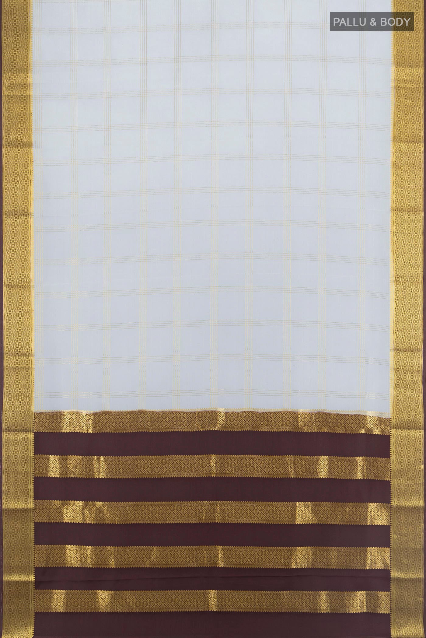 Flat view of Lilac Mysore Crepe Saree with Checked design on the body and Zari Border. 