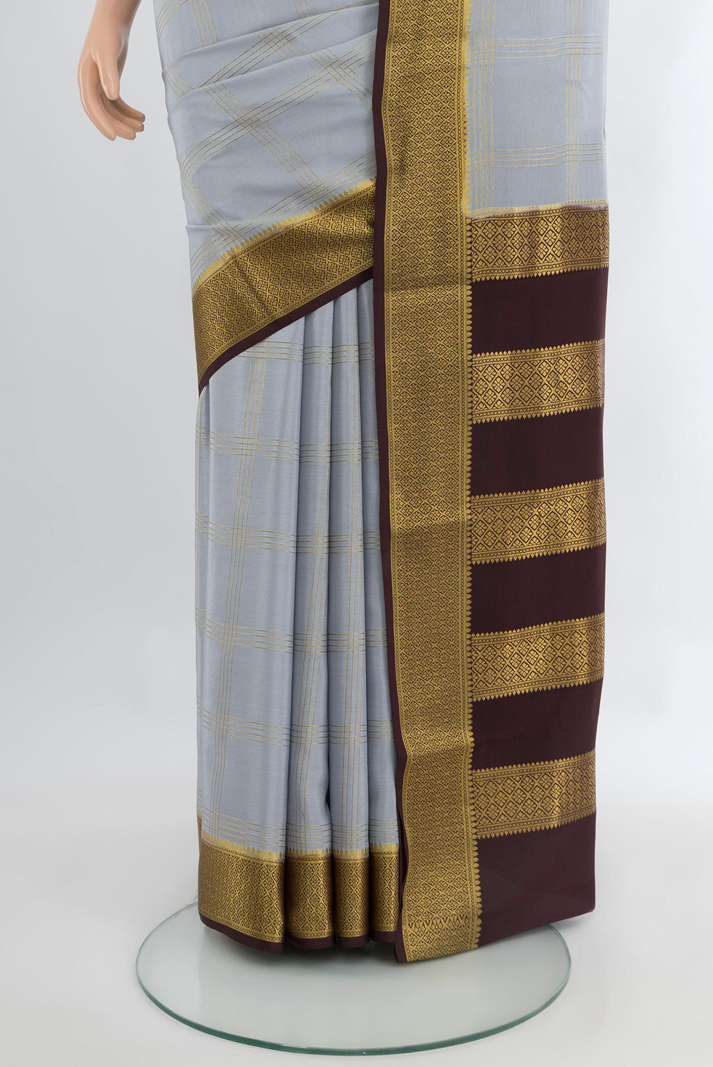 Pleats and pallu of Lilac Mysore Crepe Saree with Checked design on the body and Zari Border. 