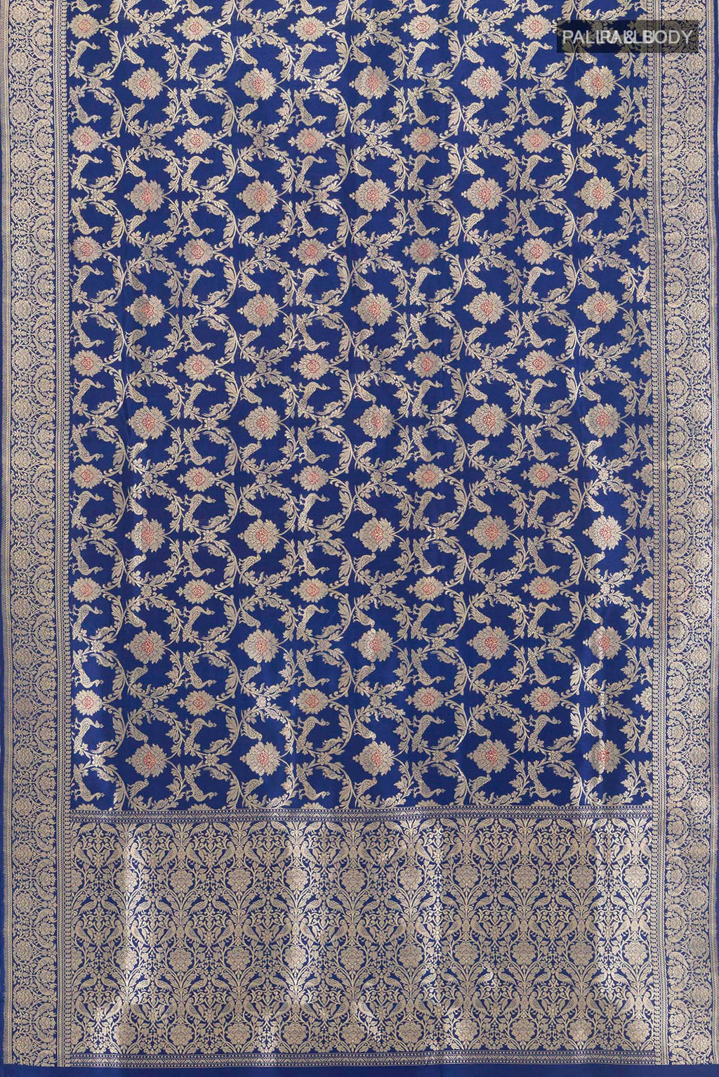 Flat view of Pure Silk Blue Banarasi Saree with Zari Brocade on the body and Zari Border. 