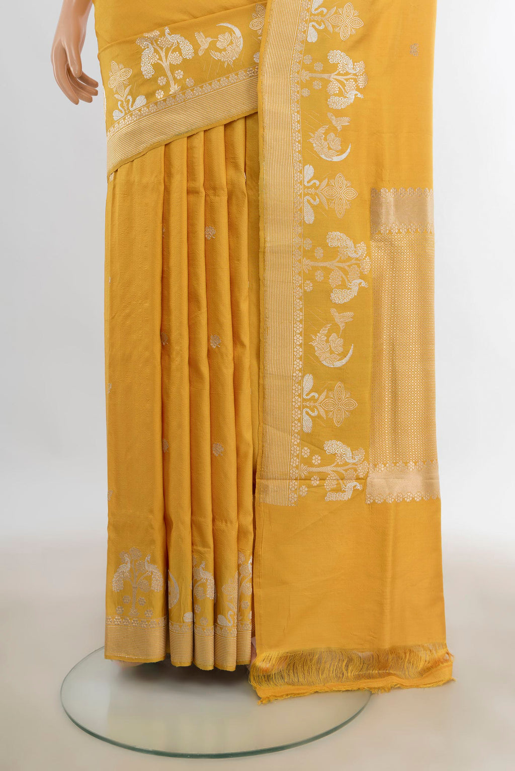 Pleats and pallu of Pure Silk Yellow Banarasi Katan Saree with Zari Butta on the body and Zari Border. 