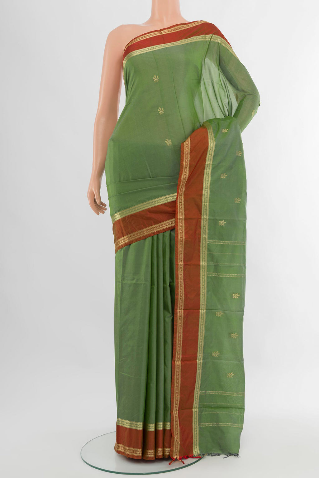 Light Green Bangalore Silk Saree with Zari Butta on the body and Zari Border.  displayed on a mannequin