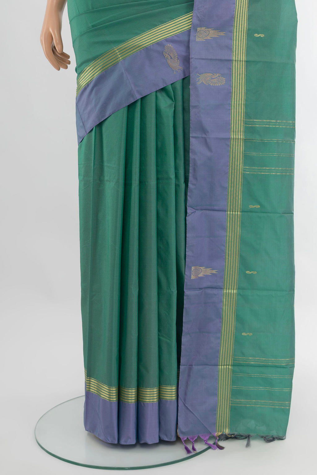 Pleats and pallu of Teal Kanjivaram Silk Saree with Zari Butta on the body and Plain Border. 