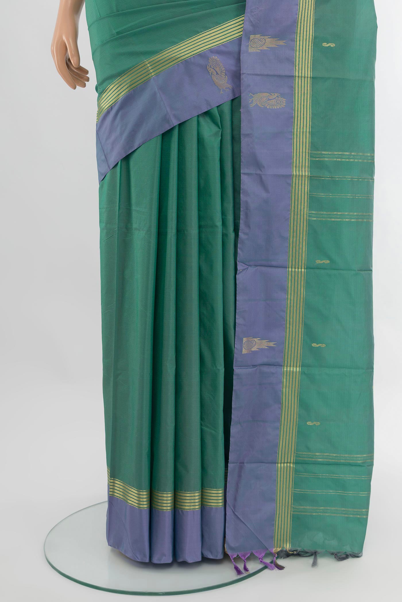 Pleats and pallu of Teal Kanjivaram Silk Saree with Zari Butta on the body and Plain Border. 