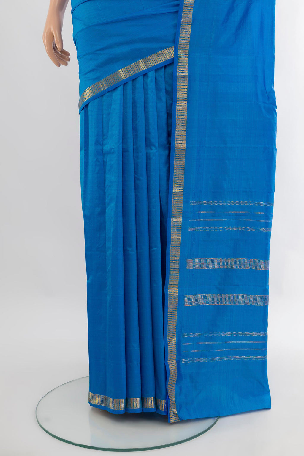 Pleats and pallu of Light Blue Kanchipuram Silk Saree with Plain Body and Zari Border. 
