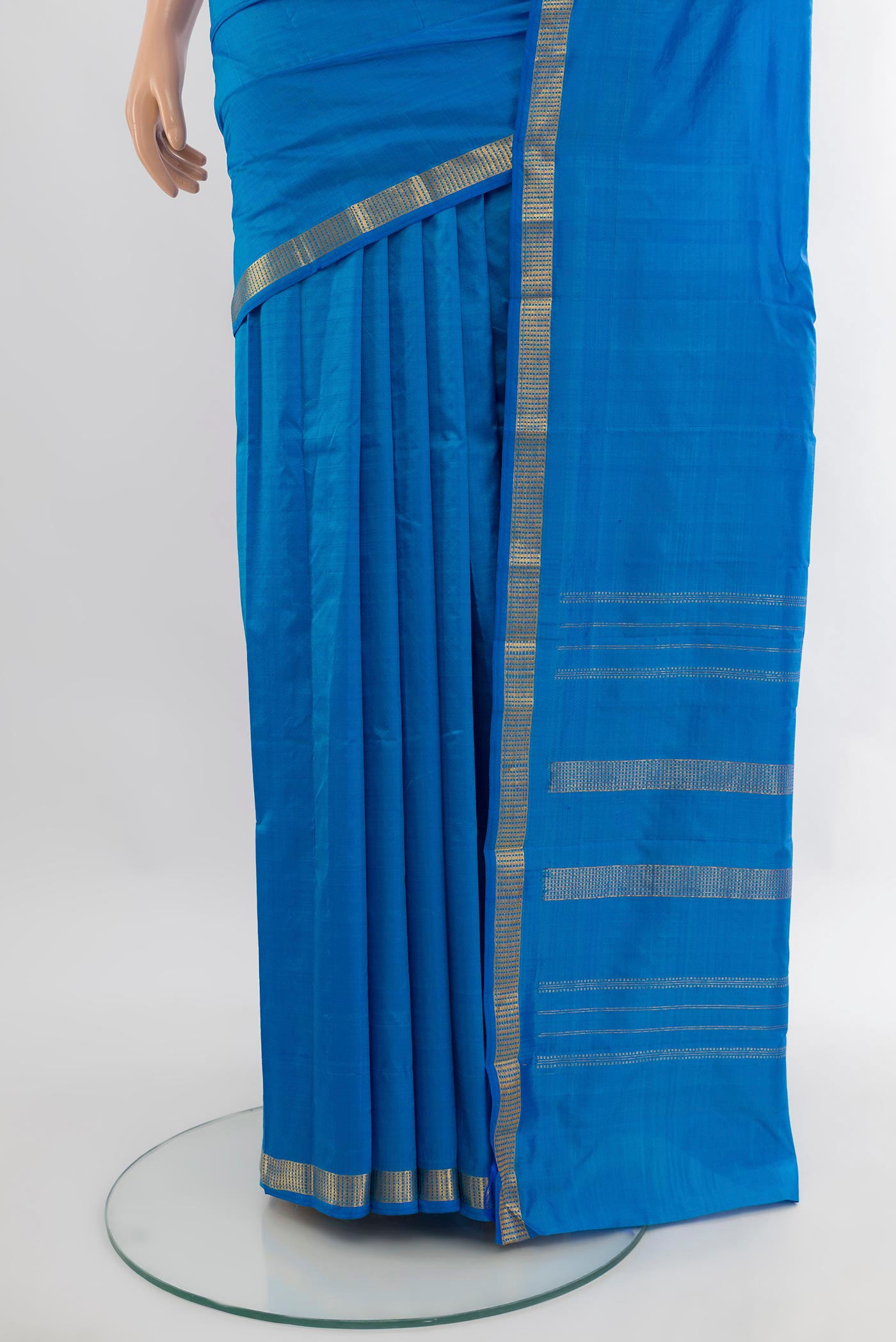 Pleats and pallu of Light Blue Kanchipuram Silk Saree with Plain Body and Zari Border. 
