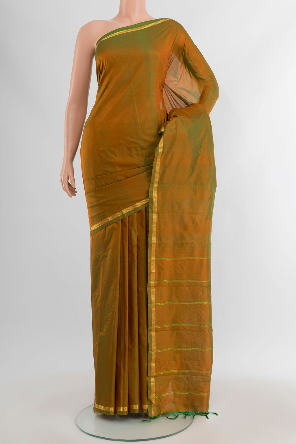 Mehandi Green Dual Tone Kanchipuram Silk Saree with Zari Butta on the body and Zari Border.  displayed on a mannequin