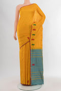 Yellow Kanchipuram Silk Saree with Thread Butta on the body and Thread Border.  displayed on a mannequin