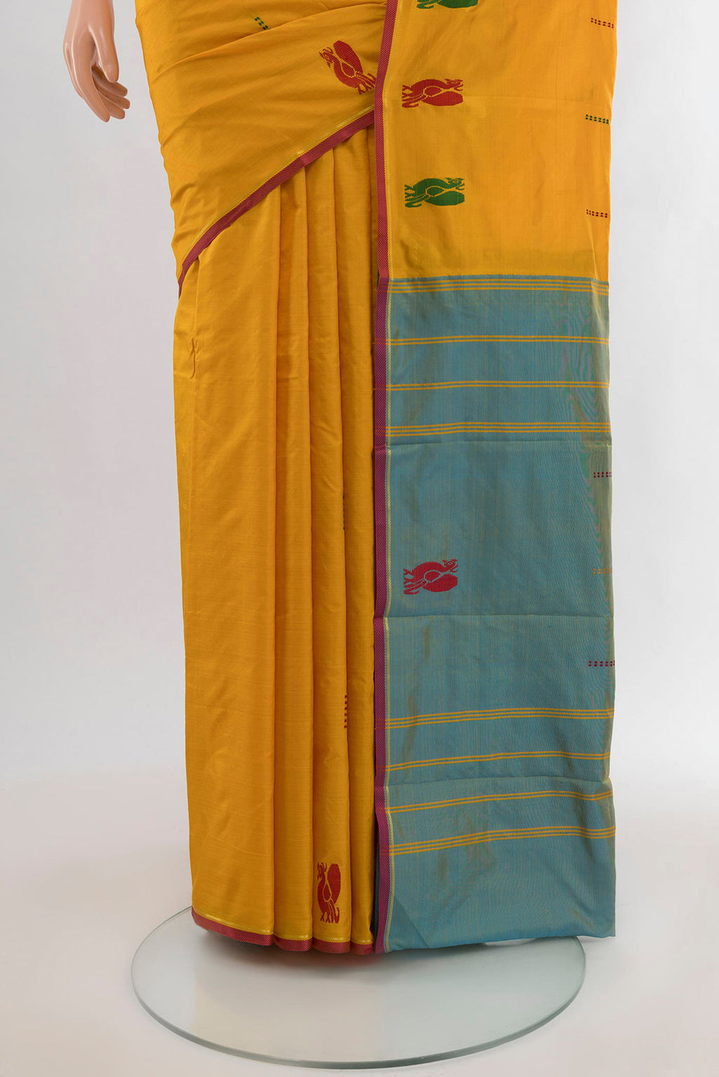 Pleats and pallu of Yellow Kanchipuram Silk Saree with Thread Butta on the body and Thread Border. 
