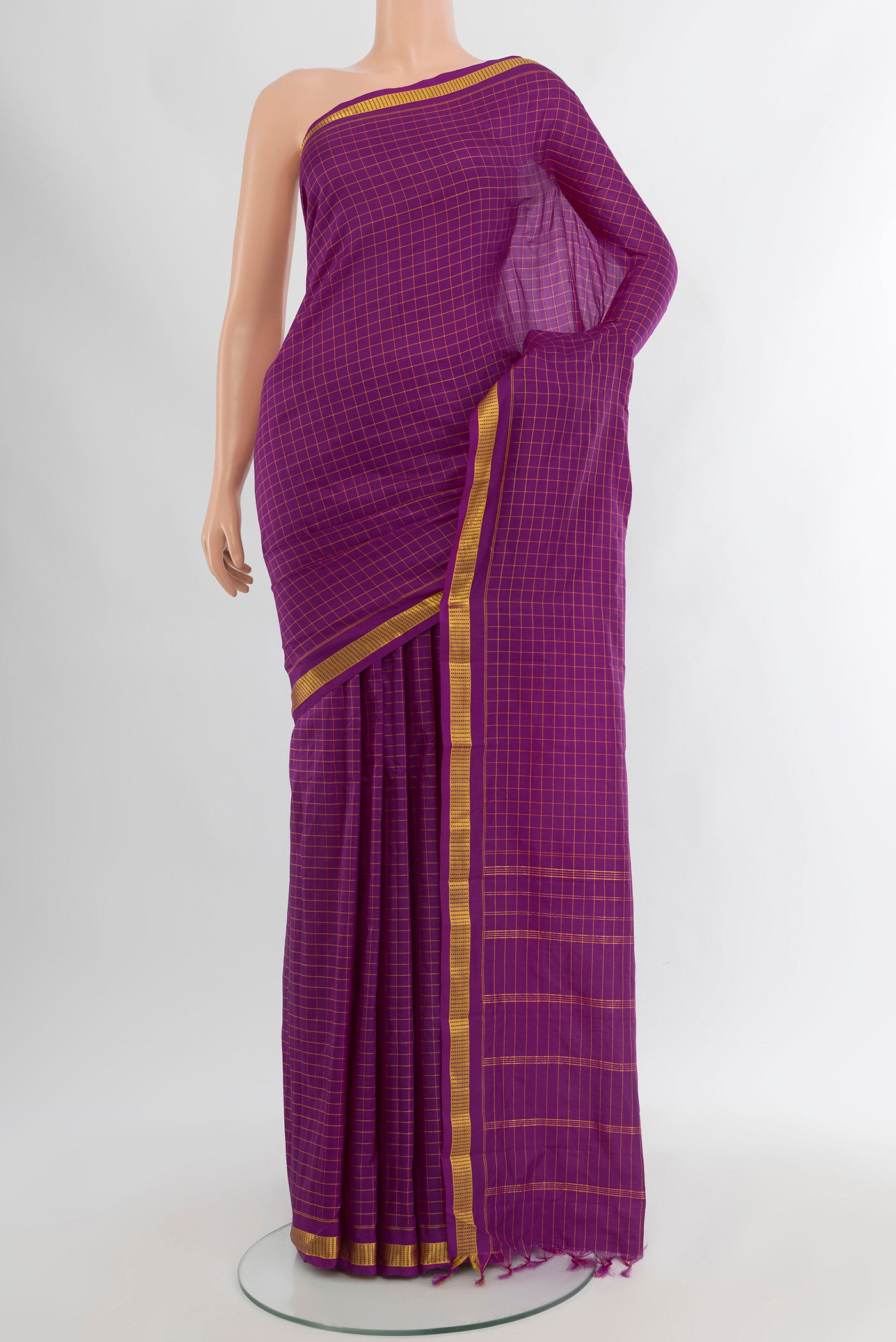 Purple Kanjivaram Silk Saree with Checked design on the body and Zari Border.  displayed on a mannequin