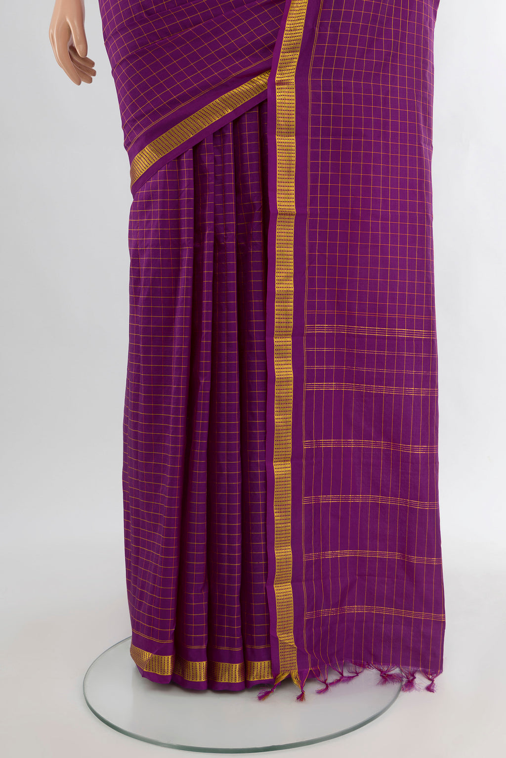 Pleats and pallu of Purple Kanjivaram Silk Saree with Checked design on the body and Zari Border. 