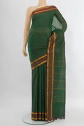 Green Kanjivaram Silk Saree with Stripes on the body and Zari Border.  displayed on a mannequin