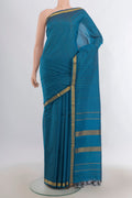Pure Silk Blue Kanjivaram Saree with Checked design on the body and Zari Border.  displayed on a mannequin