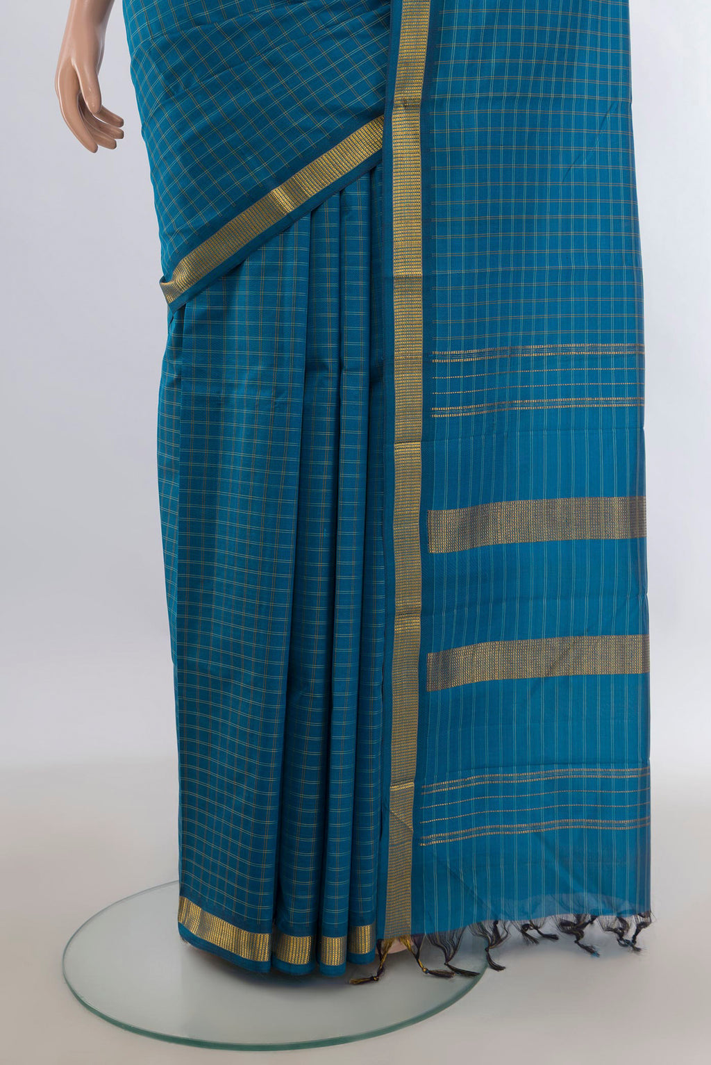 Pleats and pallu of Pure Silk Blue Kanjivaram Saree with Checked design on the body and Zari Border. 