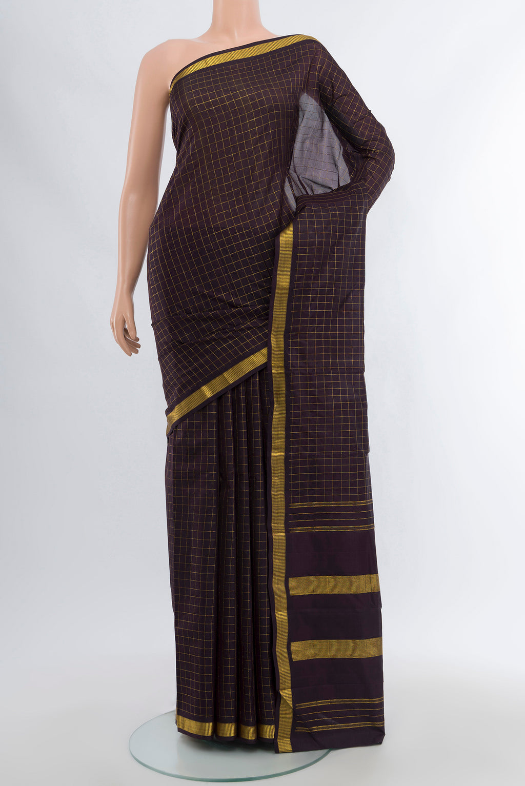 Coffee Brown Kanchipuram Silk Saree with Checked design on the body and Zari Border.  displayed on a mannequin