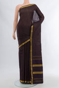 Coffee Brown Kanchipuram Silk Saree with Checked design on the body and Zari Border.  displayed on a mannequin