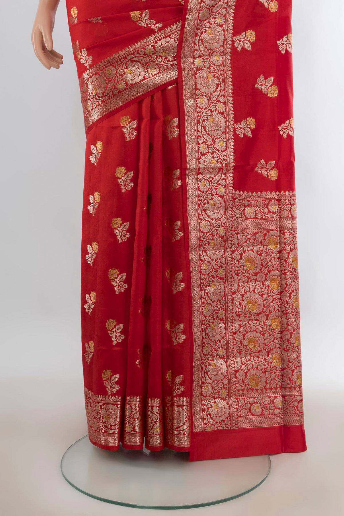 Pleats and pallu of Pure Silk Red Banarasi Raw Saree with Zari Butta on the body and Zari Border. 