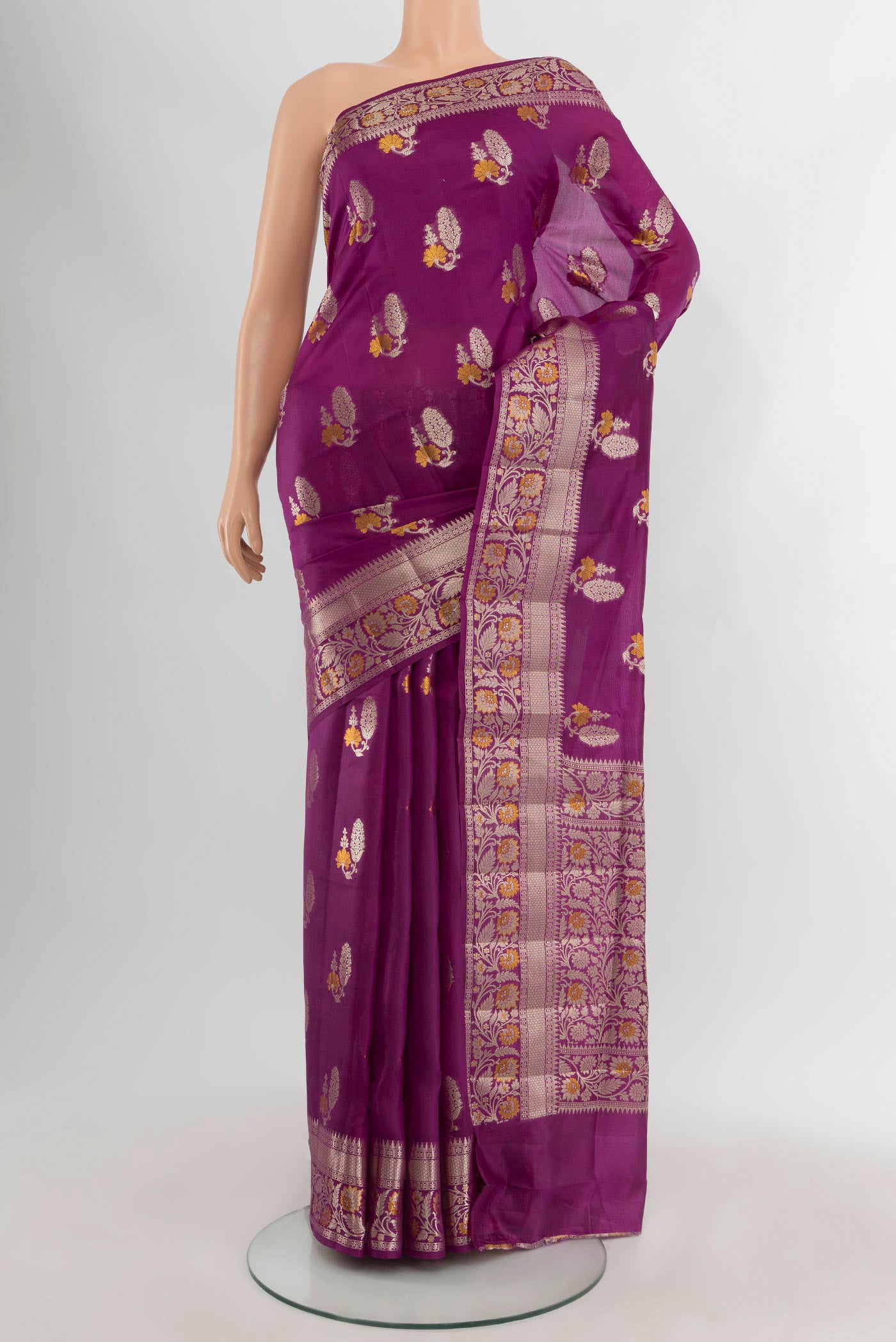Purple Banarasi Raw Silk Saree with Zari Butta on the body and Zari Border.  displayed on a mannequin