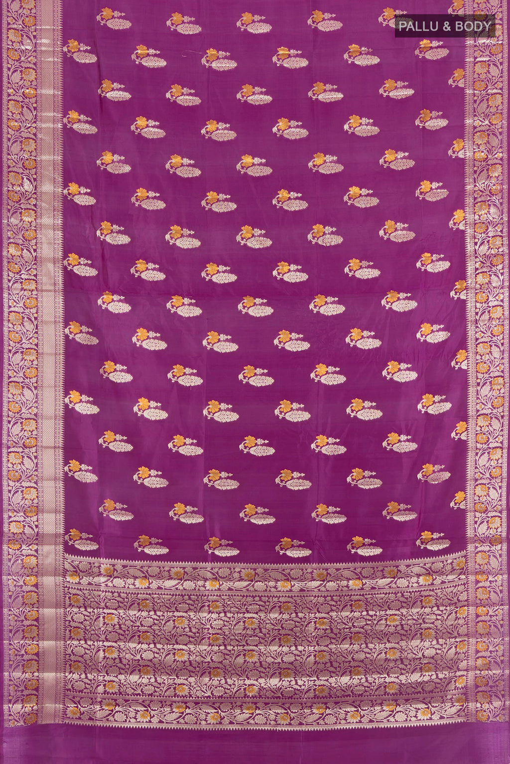 Flat view of Purple Banarasi Raw Silk Saree with Zari Butta on the body and Zari Border. 