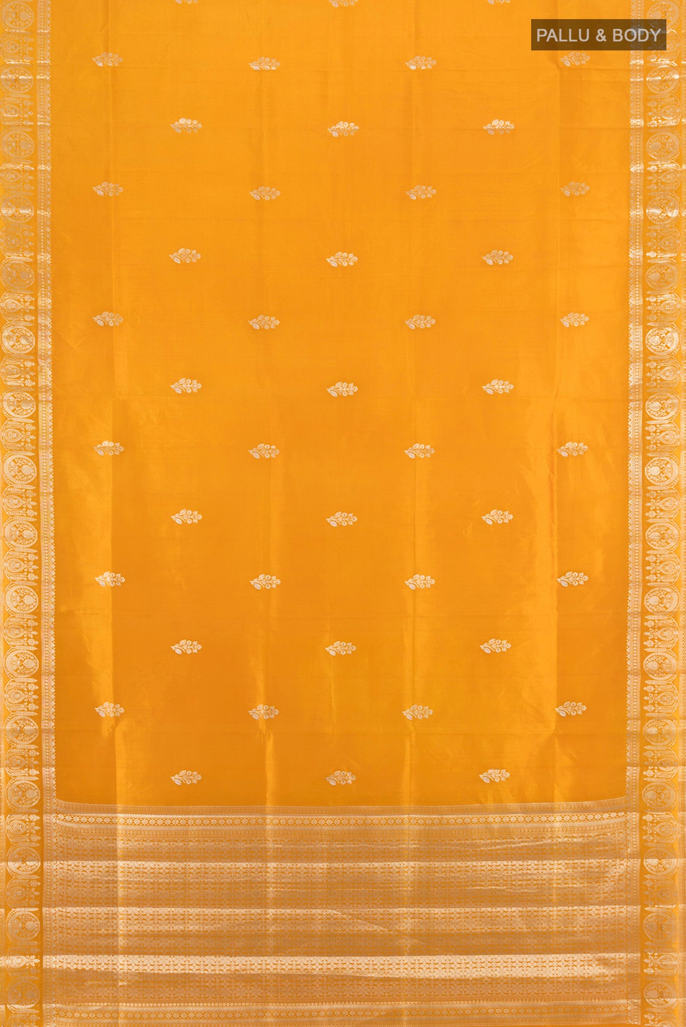 Flat view of Mustard Banarasi Raw Silk Saree with Zari Butta on the body and Zari Border. 